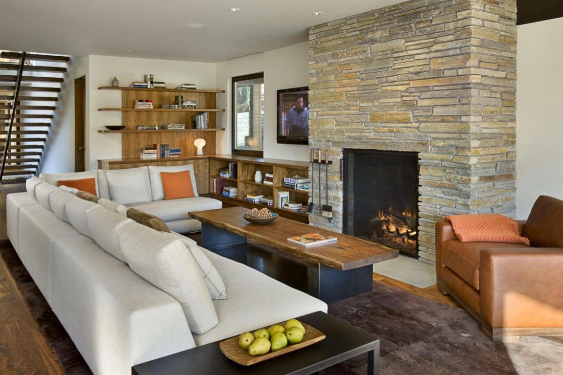 Living room with a modern stacked fireplace