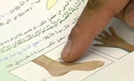 Barbaric: These textbooks handed out in Saudi Arabian schools teach children how to cut off a thief