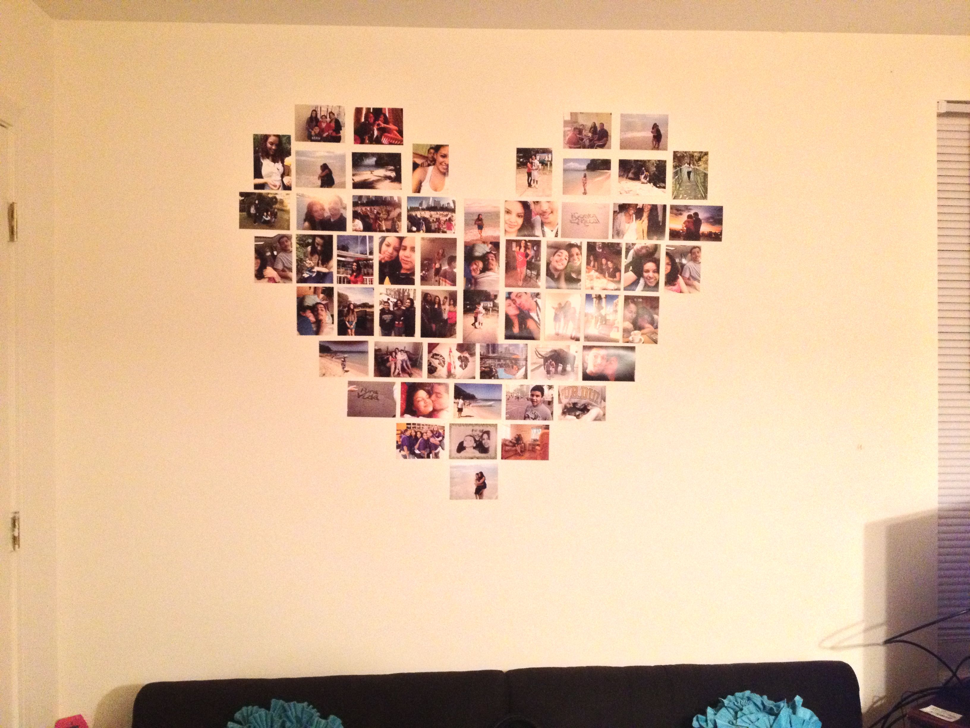 Сердце из фотографий на стене:  стены фотографиями в рамках .