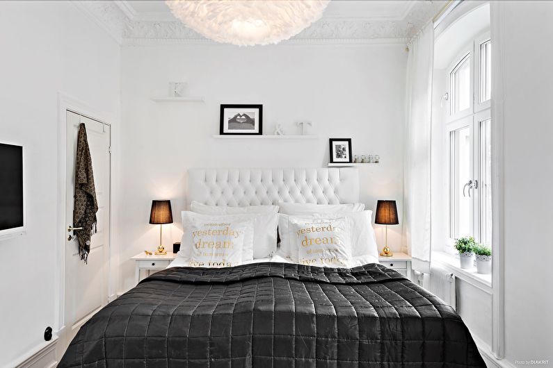 Дизайн интерьера спальни в черно-белых тонах - фото